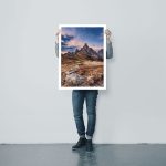 Man holding blank poster